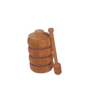 عسل‌خوری چوبی با قاشق چوبی